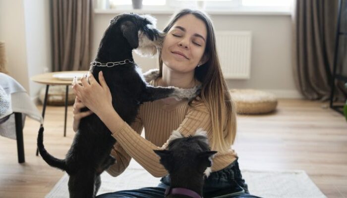 young woman with her pets 750x4001 1